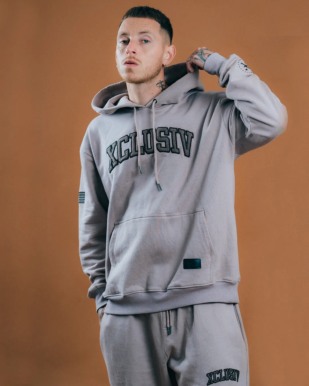 XCLUSIV CEMENT VARSITY SWEATSHIRT