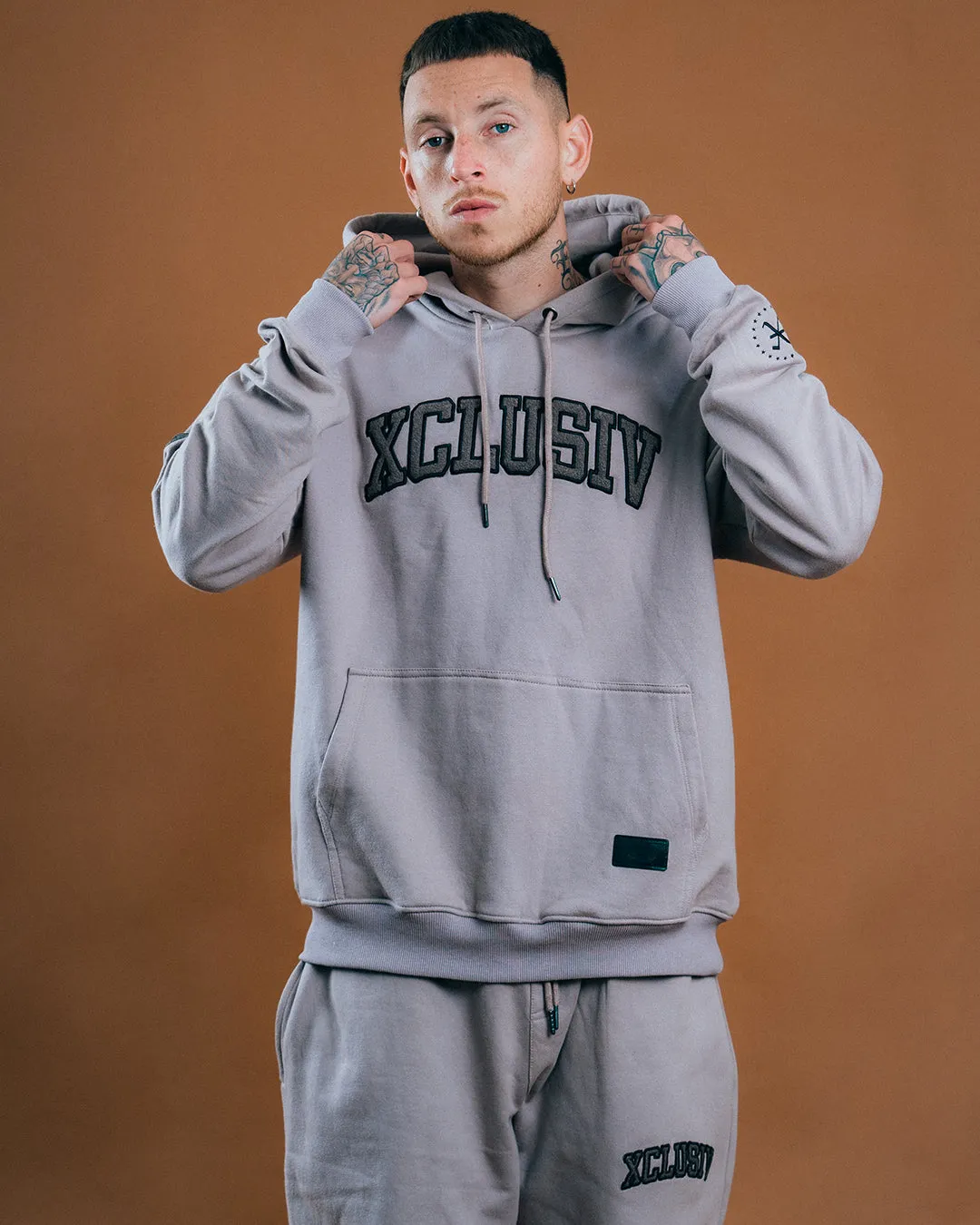 XCLUSIV CEMENT VARSITY SWEATSHIRT